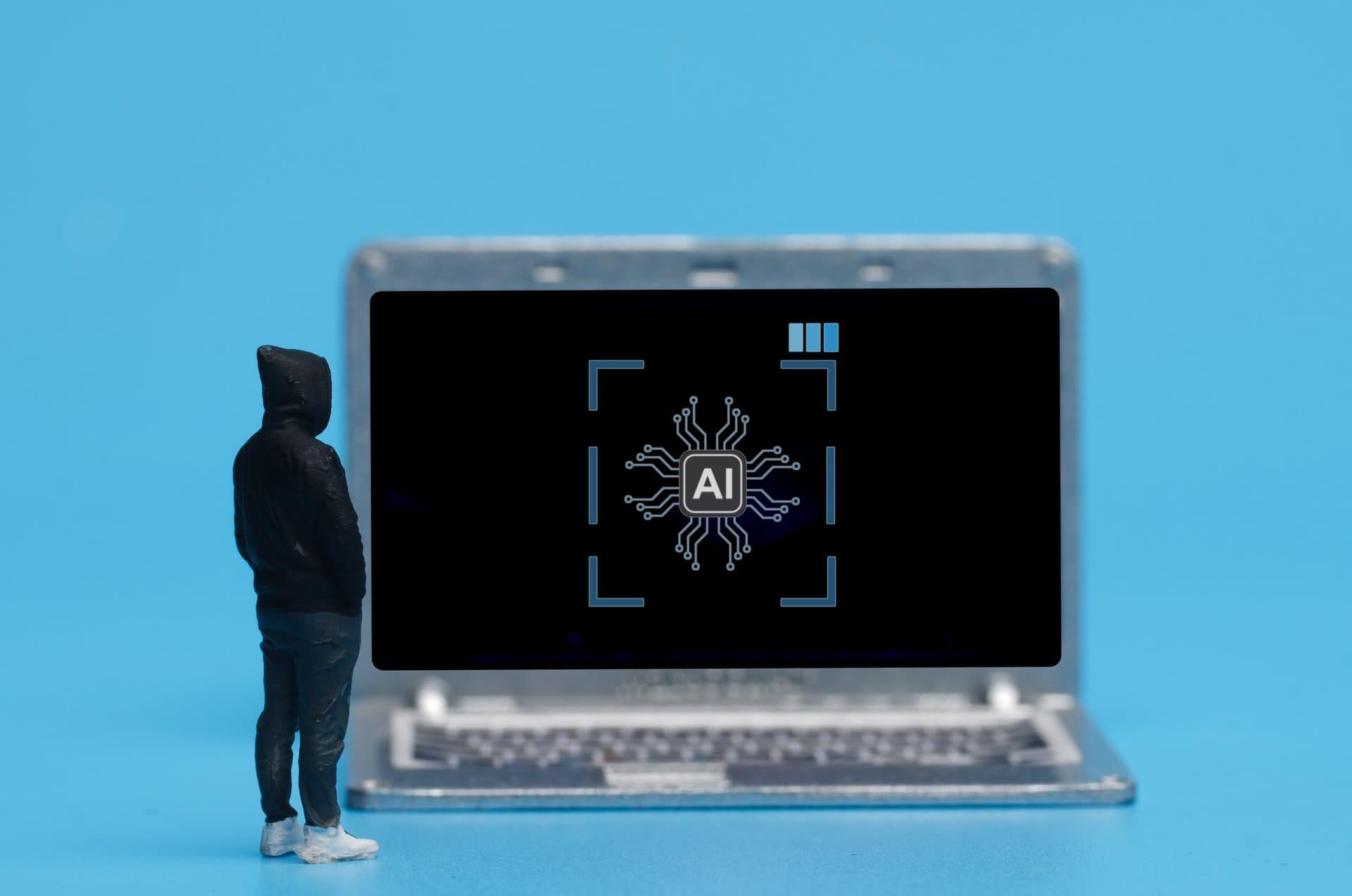Symbole de traitement par IA sur un écran d'ordinateur portable représentant l'extraction documentaire automatisée